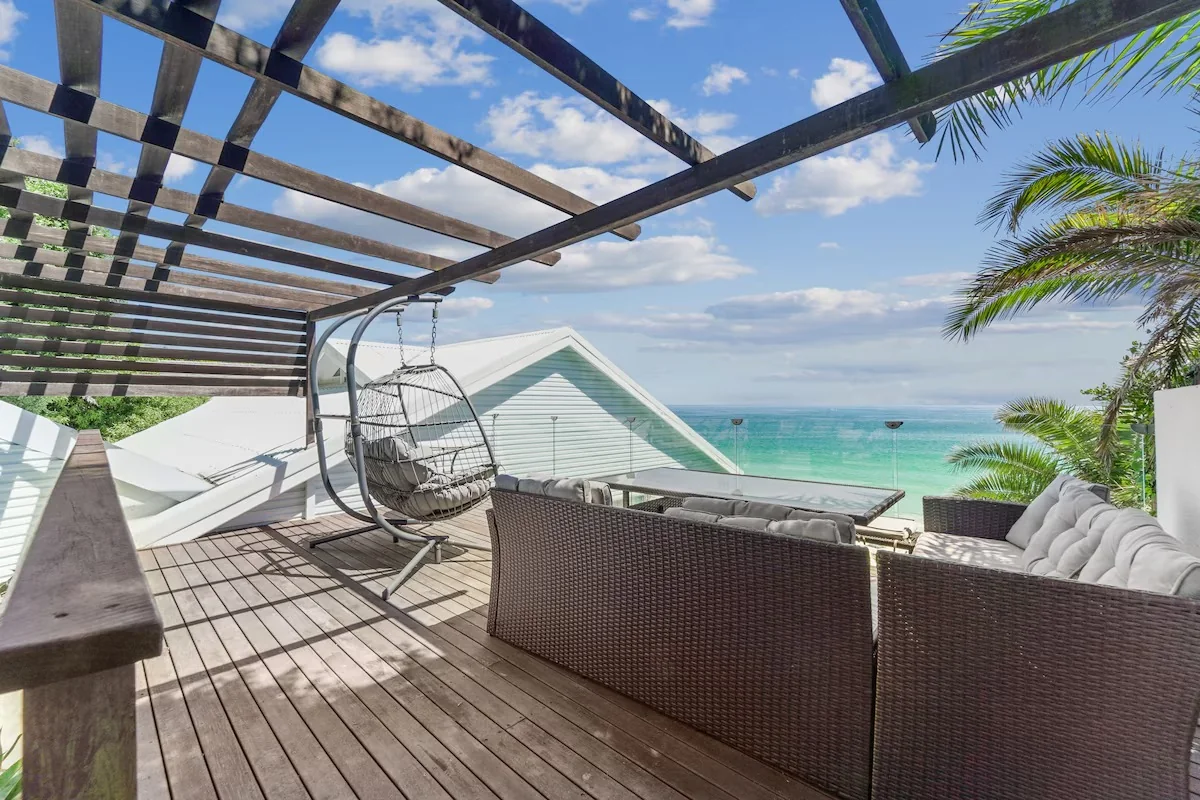 Private ocean-facing patio with outdoor seating