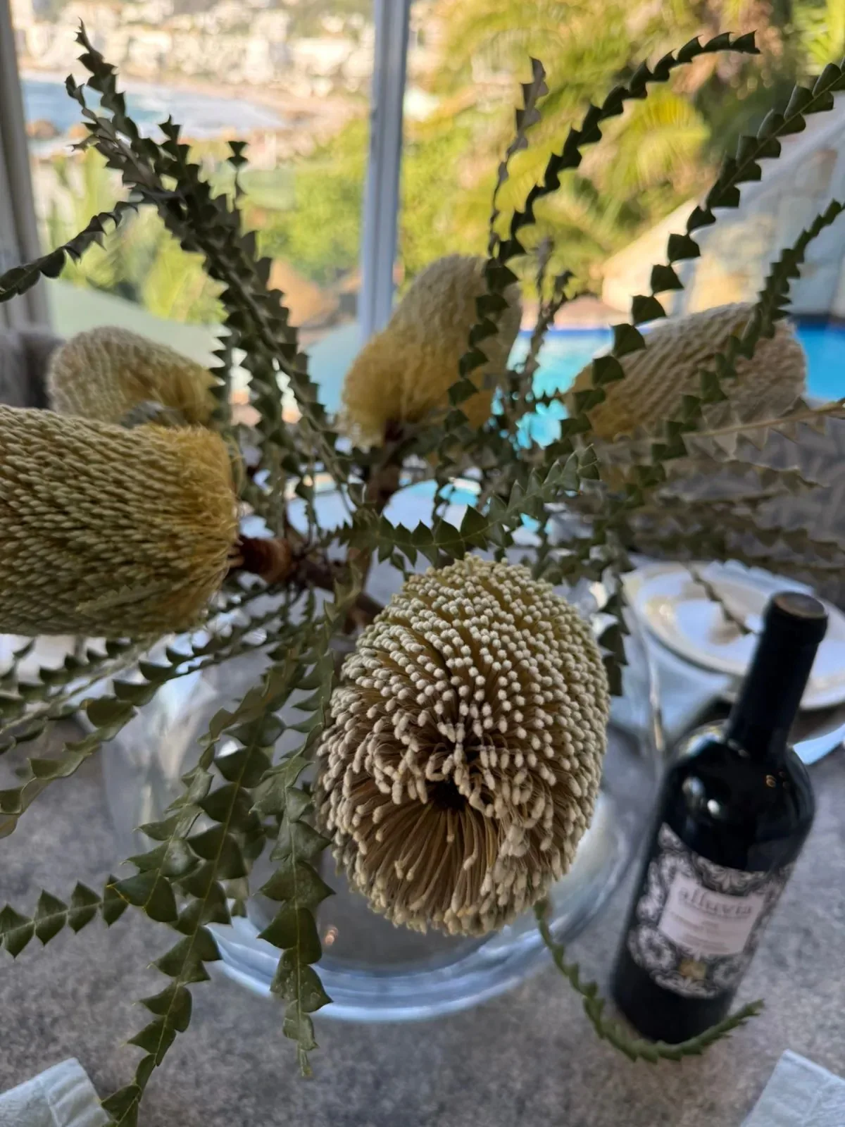 Coastal floral arrangement and dining detail