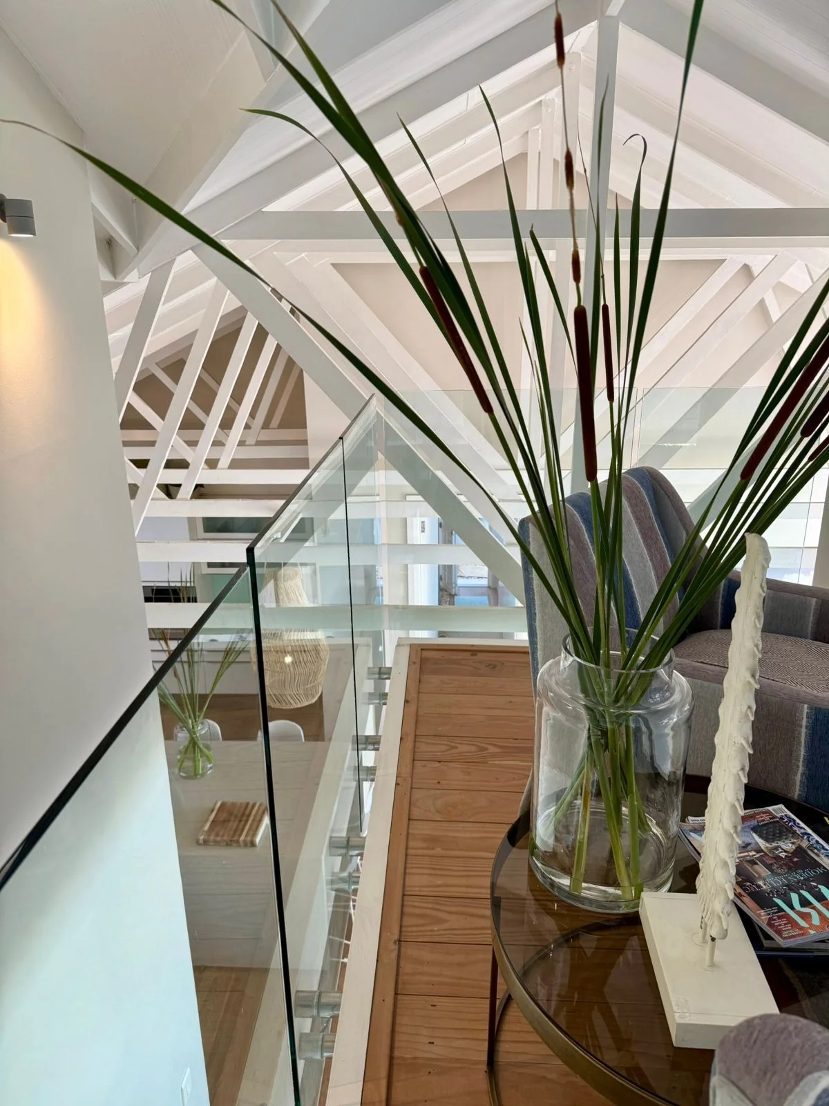 Glass staircase and interior planting